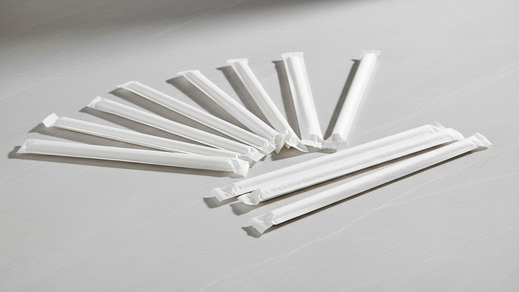 White straw wrappers arranged neatly